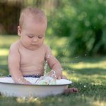 Cute,Baby,Hot,Summer,Day,Playing,With,A,Tub,Of