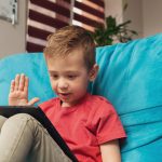 Little,Boy,Communicates,With,His,Grandparents,Via,Conference,Call