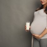 Pregnant,Woman,With,Glass,Of,Milk,Showing,Thumb,Up,Copy