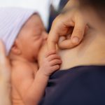 Newborn,Baby,In,Hospital,After,Just,Being,Born,,Mother,Holding