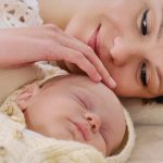 Mother,Lie,Near,The,Baby,And,Tenderly,Touching,Him;,Softly