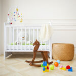 Empty,Nursery,Room,With,Basket,,Toys,And,Wooden,Horse