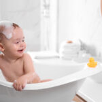 Cute,Little,Baby,In,Bathtub,At,Home