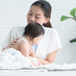 Cute,Caucasian,Little,Naked,Toddler,Baby,Girl,Sitting,On,Towel
