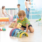 Kids,Playing,On,Floor,With,Educational,Toys.,Toys,For,Preschool