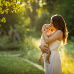Young,Beautiful,Mother,Plays,With,Her,Child,Outdoor.