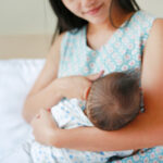 Close-up,Infant,Baby,Feeding,From,Mother,Breastfeeding,Her,Newborn,Child