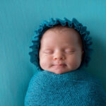 A,Smiling,,Three,Week,Old,,Newborn,Baby,Girl,Wearing,A