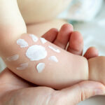 Cute,Little,Baby,Hand,And,Sun,Shape,Drawn,With,Protective
