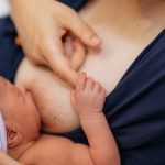 Newborn,Baby,In,Hospital,After,Just,Being,Born,,Mother,Holding