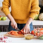 Healthy,Eating.,Front,View,Of,Female,Hands,Making,Salad,Cutting