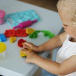 side-view-kid-playing-table
